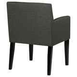 Catherine Grey Upholstered Dining Arm Chair on dining room floor