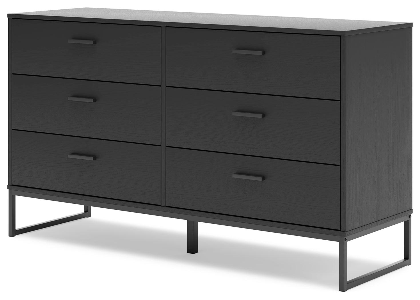 Top detail of Socalle dresser showing wood grain matte black finish