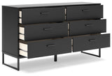Close-up of dark pewter-tone metal drawer pulls on Socalle dresser