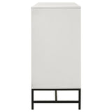 Black metal base supporting Sonora white dresser