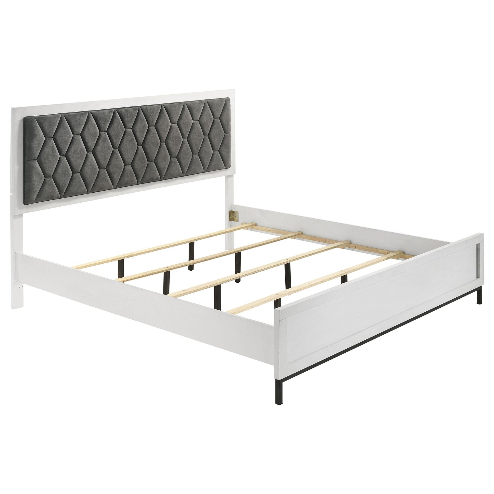 Detailed view of white leatherette upholstered headboard