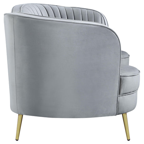 Detail of tufted back cushion on sofa