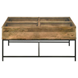 Stephie coffee table displaying memorabilia inside compartments