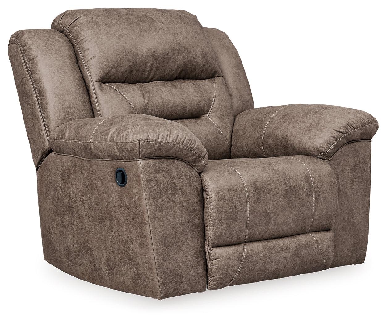 Stoneland Fossil sofa set showcasing faux leather upholstery