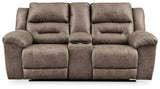 Dual cup holders in loveseat console