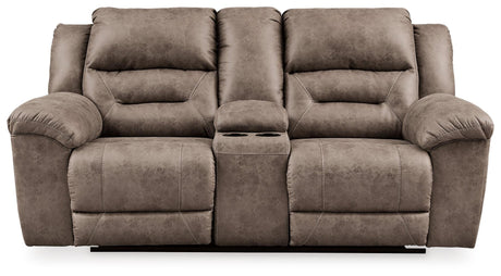 Dual cup holders in loveseat console