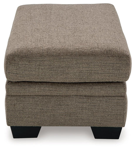 Stonemeade Nutmeg Chenille Ottoman shown in a living room setting