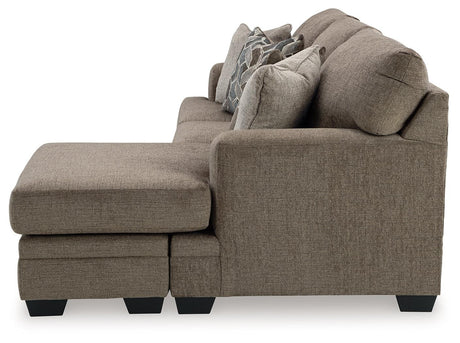 Side profile of sofa chaise with movable ottoman