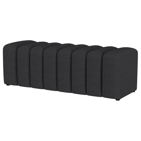 Side view showing plastic glide feet on charcoal bench