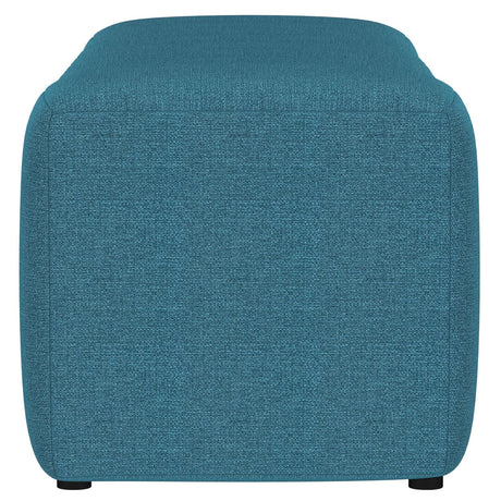 Detail of firm foam cushioning under peacock blue fabric on Summer bench