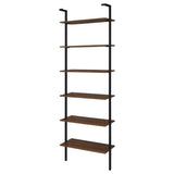 Shelf holding books and decor accessories