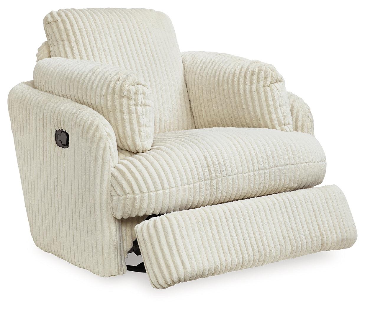 Reclining position of ivory velvet swivel glider recliner
