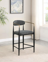 Side view of Tina metal counter height bar stool with padded seat and footrest