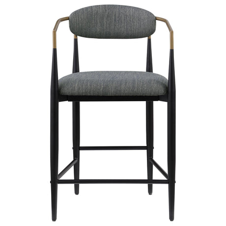 Close-up of dark grey fabric upholstery on Tina bar stool seat