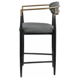 Metal frame and built-in footrest detail on Tina bar stool