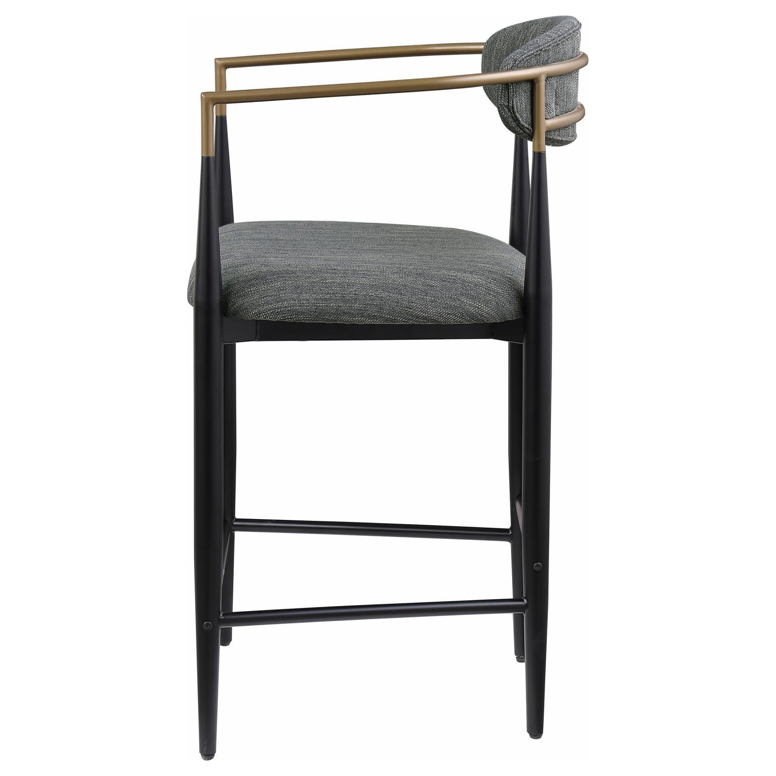 Metal frame and built-in footrest detail on Tina bar stool