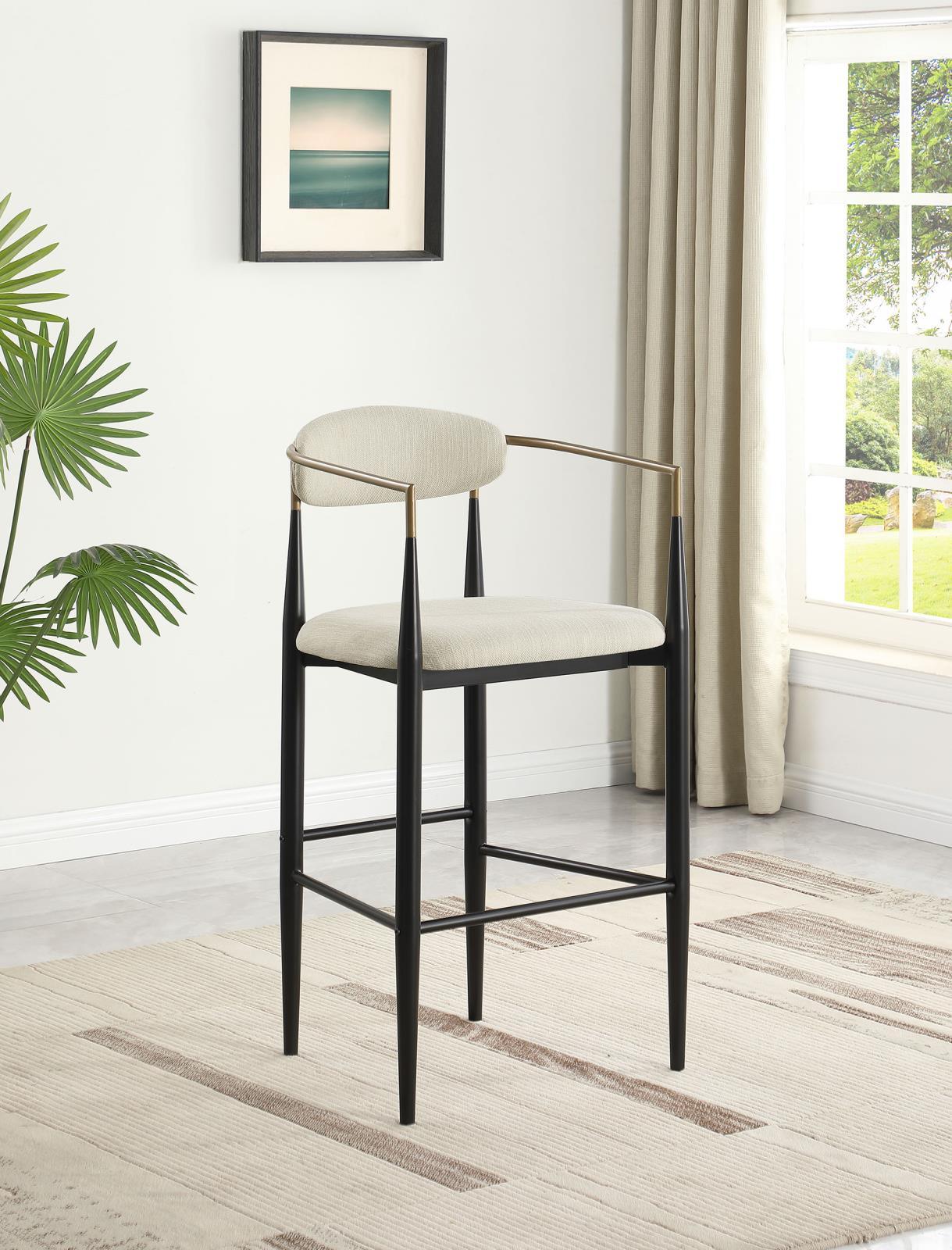 Side angle of Tina beige upholstered metal pub height bar stool