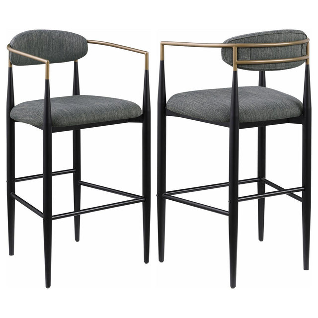 Tina pub height bar stool with dark grey upholstered seat and back, side view