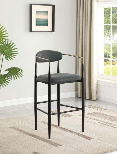 Tina set of 2 pub height bar stools, front angle showing upholstery and frame