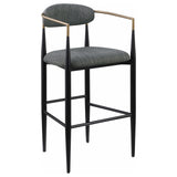 Close-up of Tina bar stool fabric upholstery and bentwood armrest