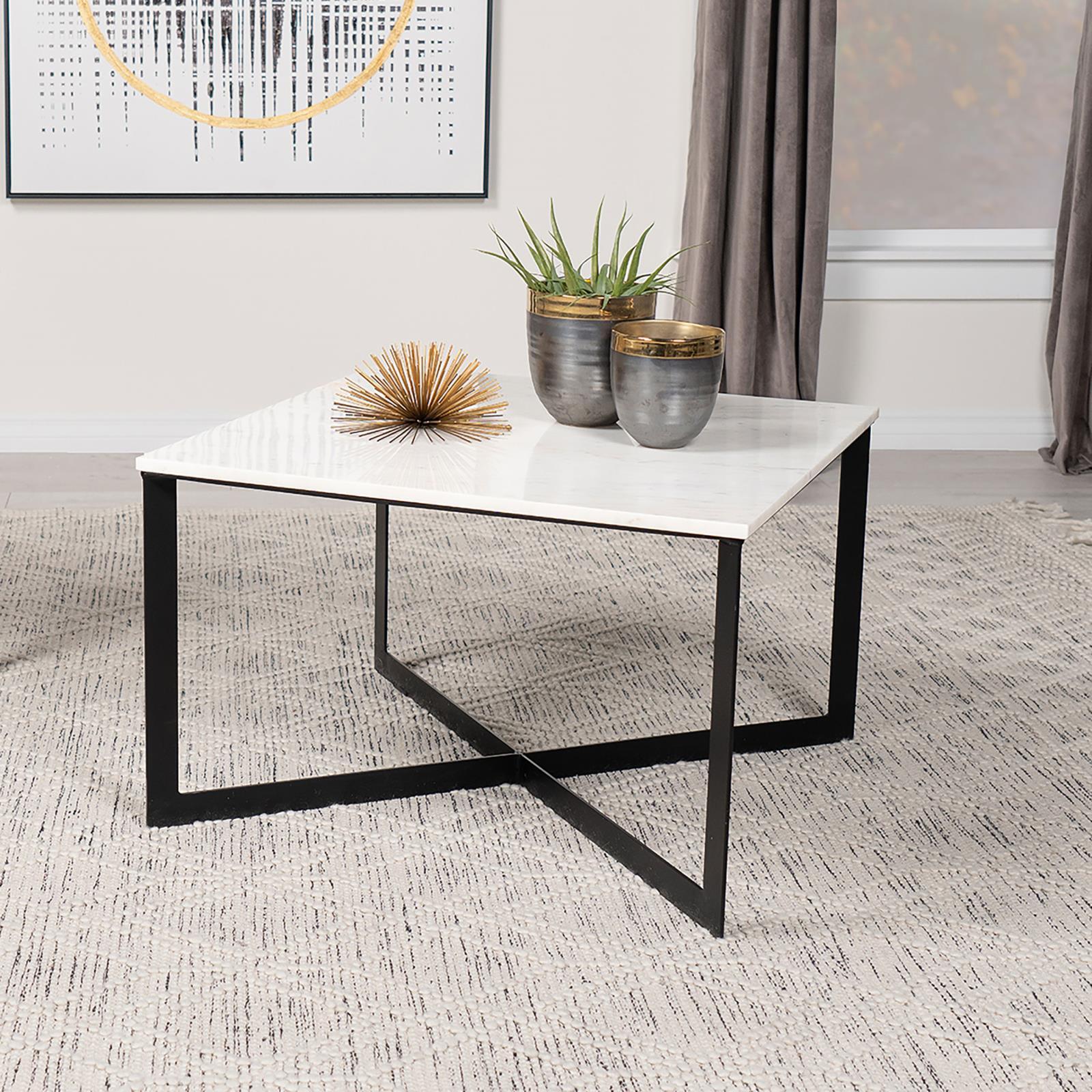 Side angle of Tobin Square Coffee Table highlighting crisscross metal support and marble top