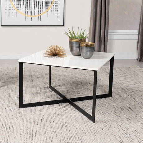 Side angle of Tobin Square Coffee Table highlighting crisscross metal support and marble top