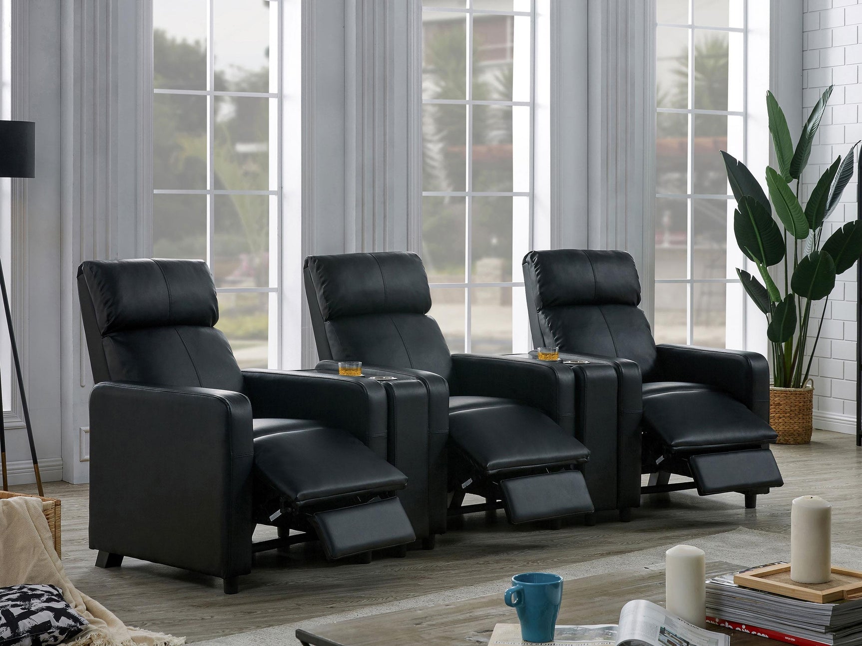 Side angle of Toohey black tufted recliner seat