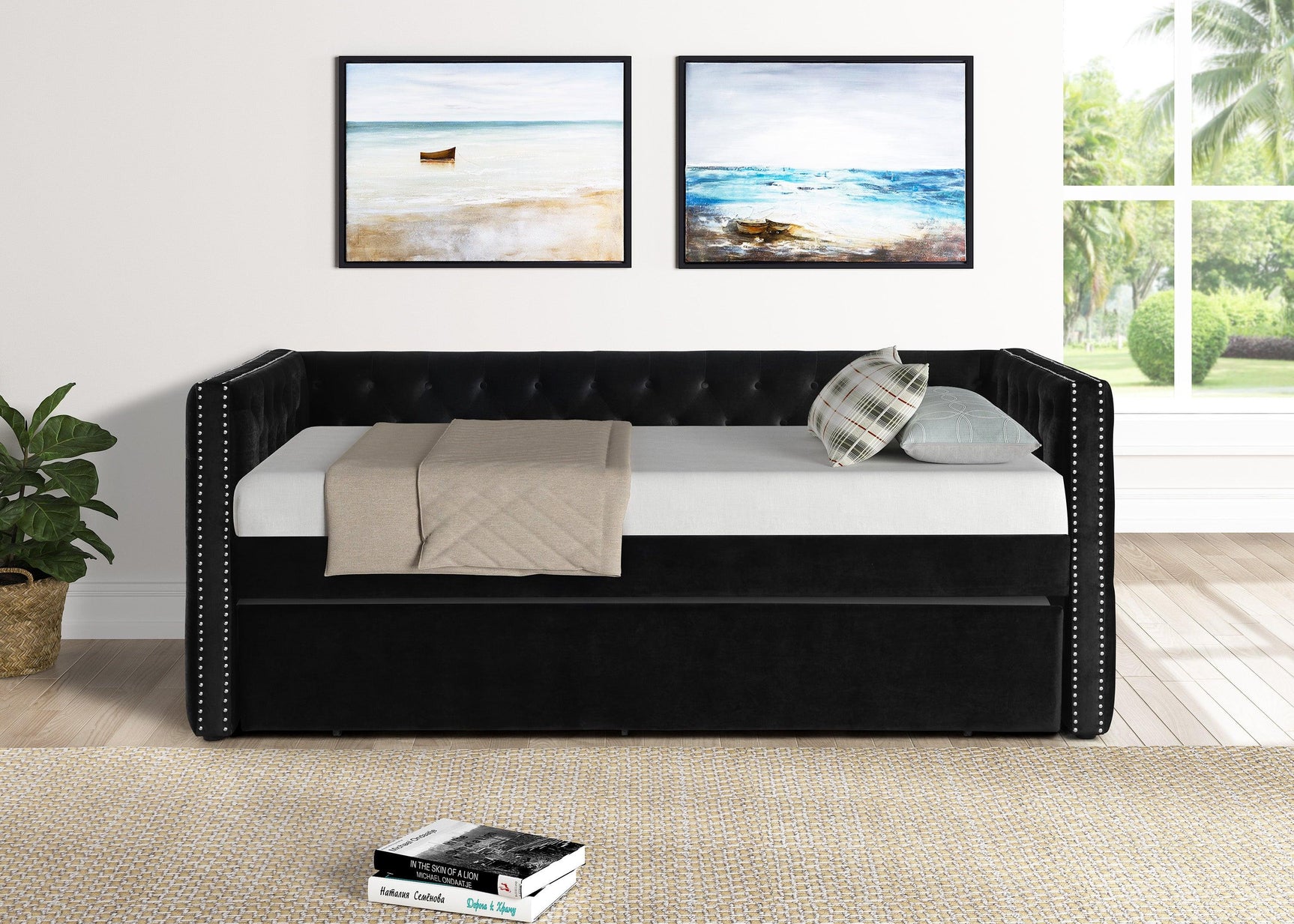 Side view of Trina black velvet tufted twin daybed