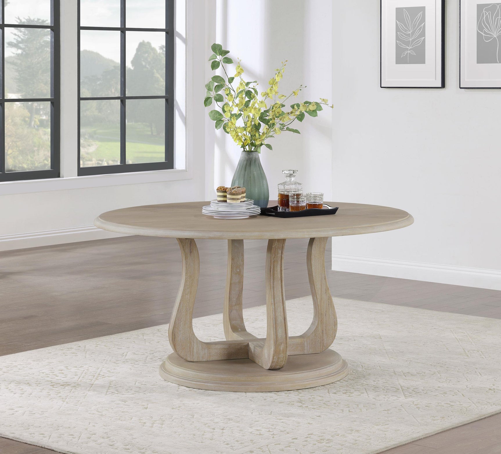 Trofello round 60-inch white washed pedestal dining table angled view