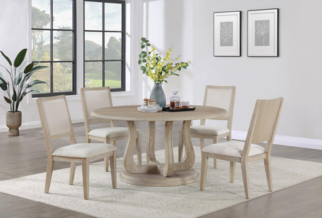 Trofello round 60-inch white washed pedestal dining table in room setting