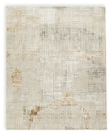 Abstract patterned Truward rug detail showing linen, gray, and caramel colors