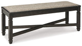 Close-up detail of dining table surface of Tyler Creek set