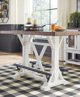 Angle showing table and stools highlighting two-tone finish
