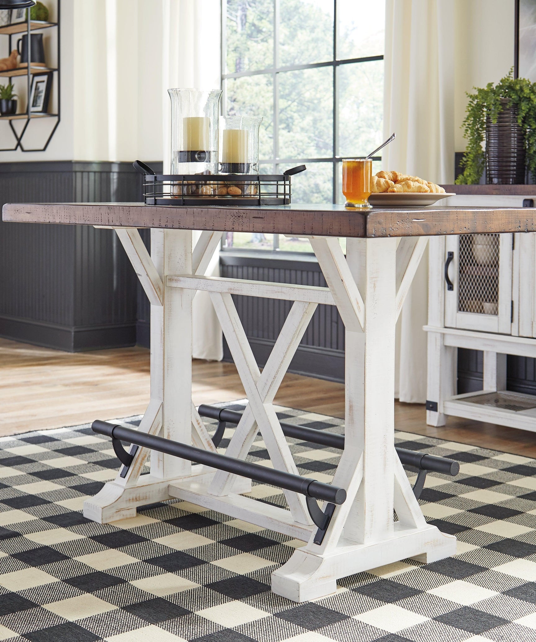 Angle showing table and stools highlighting two-tone finish