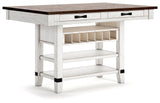 Valebeck dining table showing side with drawers and wine rack