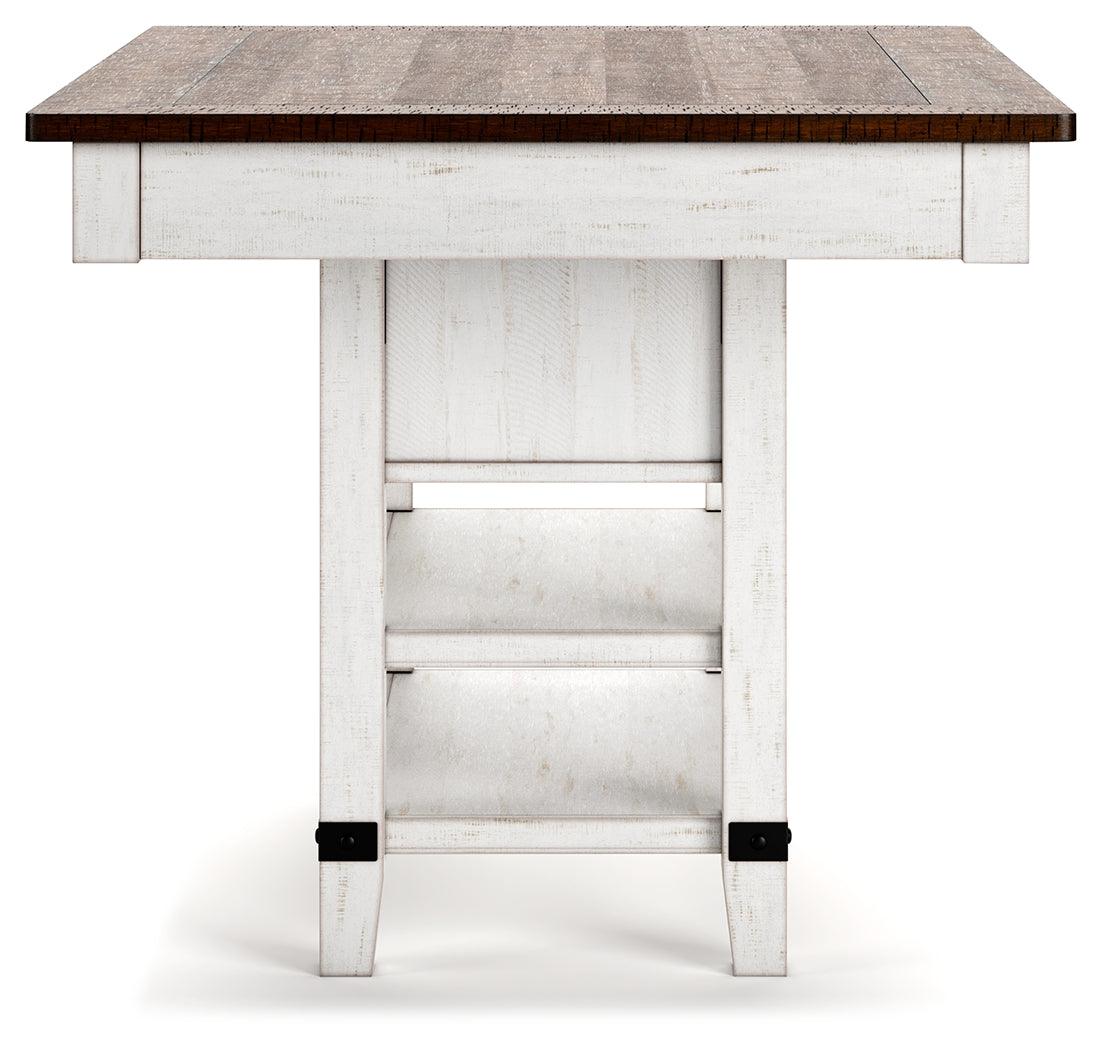 Full view of Valebeck counter height table in dining room setting