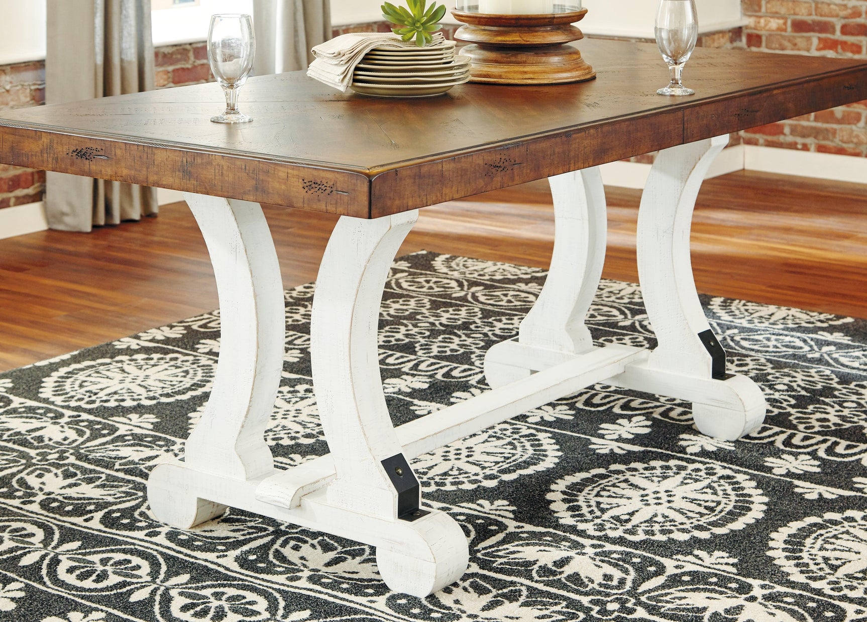 Detail of upholstery and black metal accents on Valebeck set