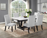 Room view of Varley Vance dining set with white marble top and fabric chairs