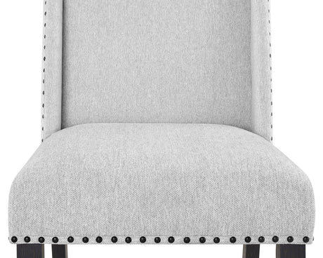 Room setup with Varley Vance white marble top dining table and upholstered chairs