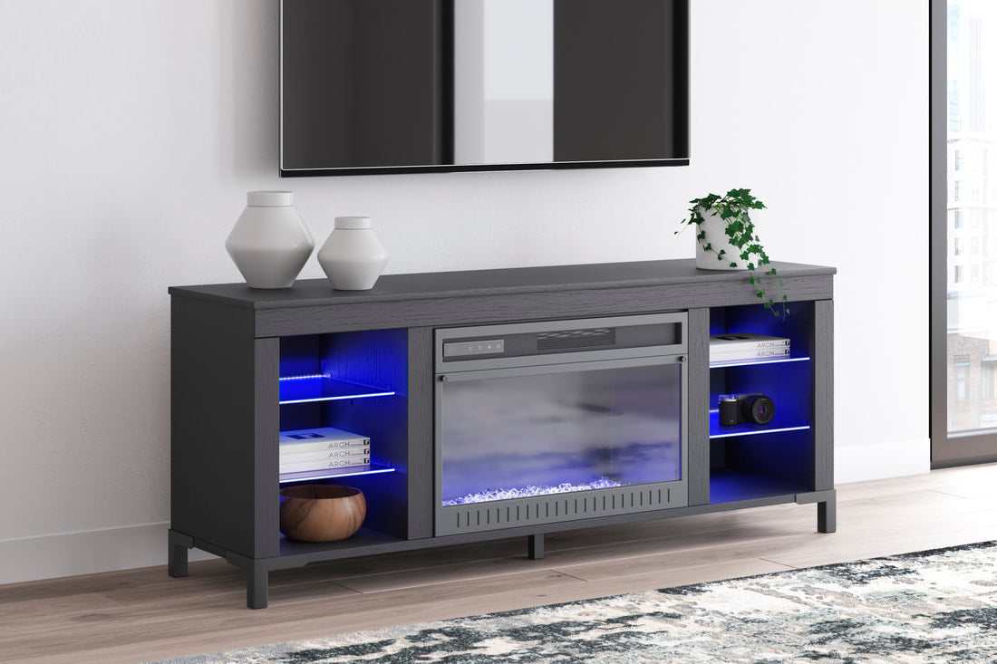 Black TV stand with blue LED lights illuminated, front view