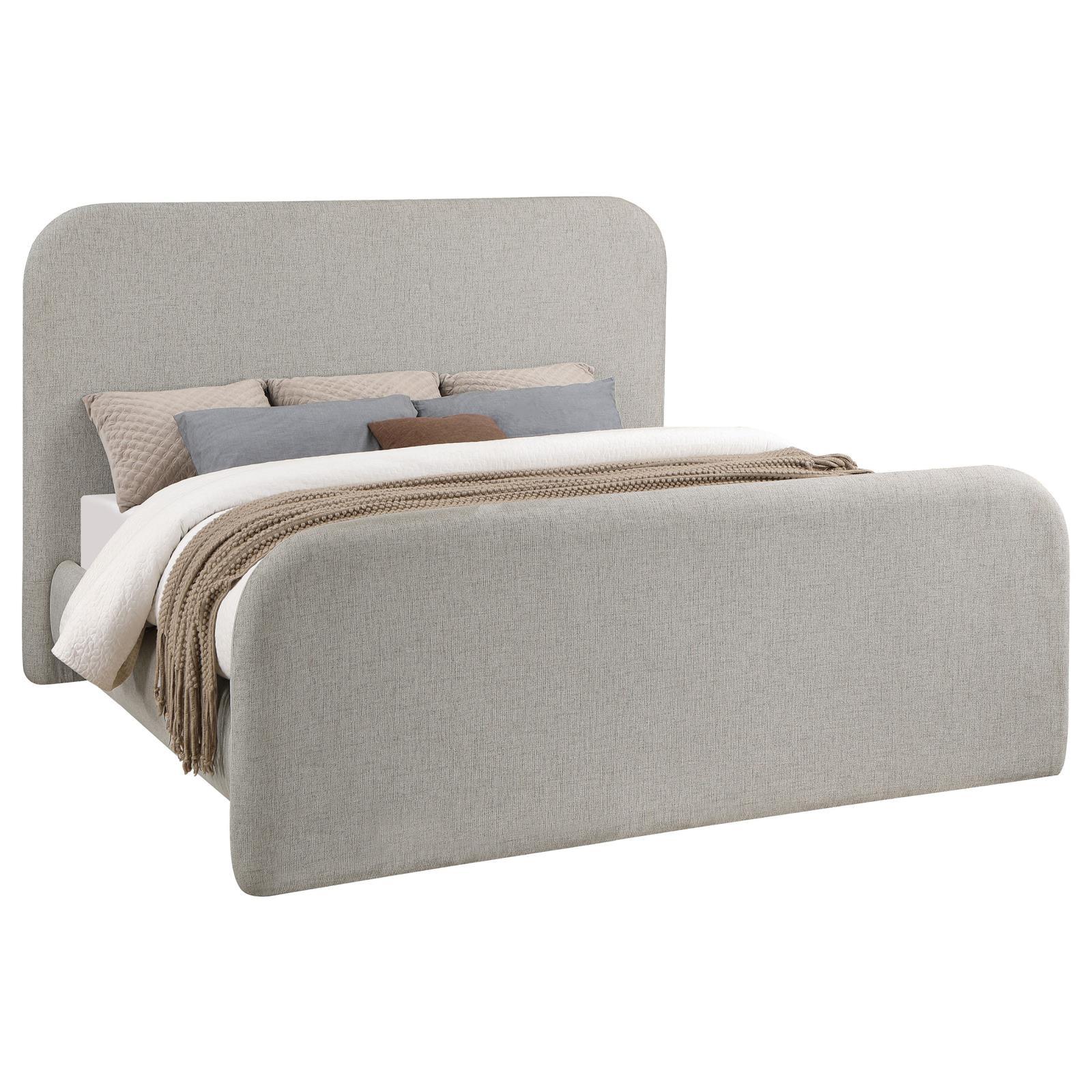 Side view of grey upholstered queen platform bed