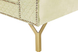 Close-up of tufted beige velvet upholstery on Zia sectional